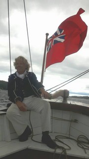 Capt Simpson at the helm on this windy day.